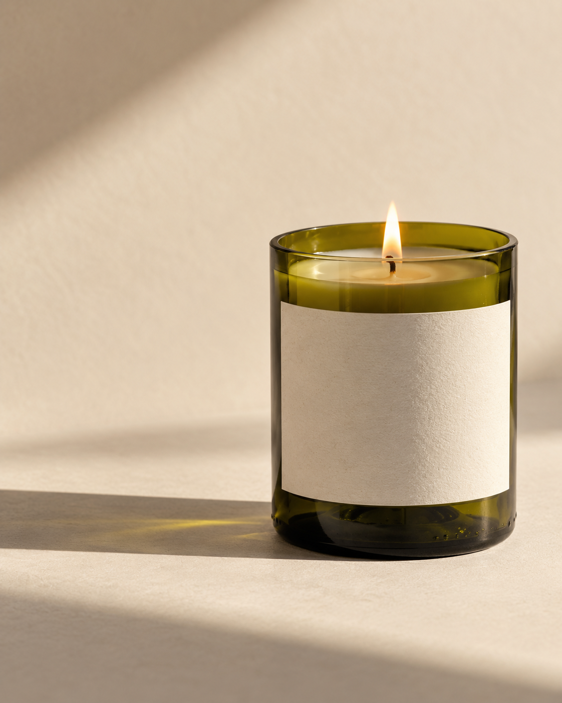 Concept rendering of a candle made in an olive-green wine bottle